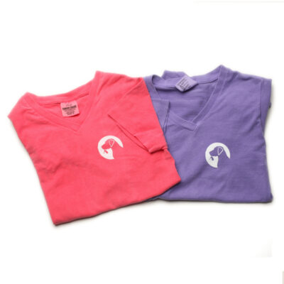 Violet and pink Ladies V-neck tees laying flat.